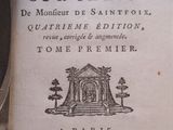 an old book with a picture of a building on it