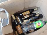 a box full of bottles of wine and a bottle of wine