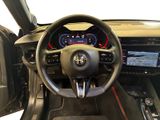 a picture of the interior of a car with a steering wheel and dashboard