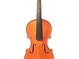 an orange violin sitting on top of a white surface