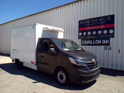 a picture of a van parked outside of a building