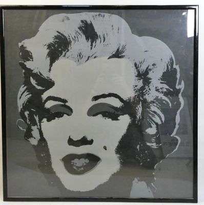 framed black and white photograph of a woman ' s face in a black and white frame