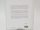 the back cover of a book with a picture of a cat on it