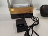 a box that has a charger and headphones on it