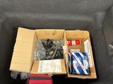 two boxes of items in the back of a car
