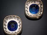 a pair of sapphire and diamond earrings
