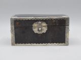 an old metal box with a lock on the top