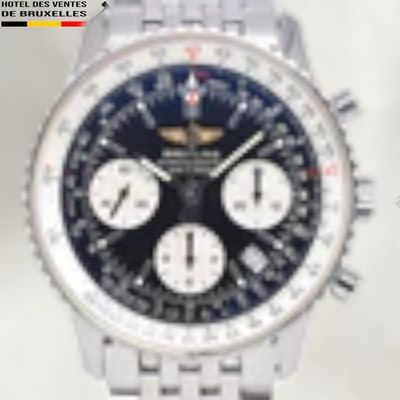 a close up of a watch on a white surface