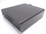 an image of a black desktop computer sitting on top of a white surface