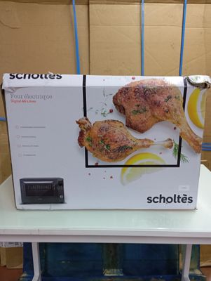 a box that is sitting on a table with a chicken in it