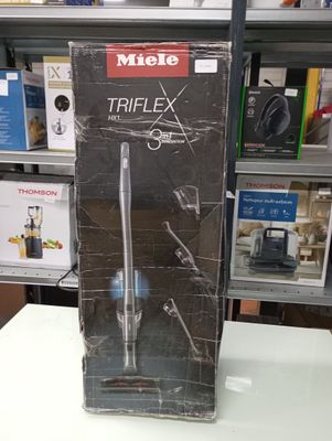 a box with a knife inside of it on a table