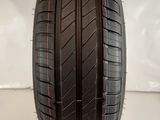 a close up of a tire on a white surface