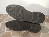 a pair of shoes that are sitting on the floor
