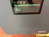 a machine that is sitting on the floor in the room