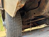 a close up of a tire on the side of a truck