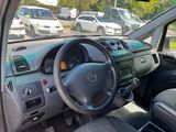 a car with a steering wheel and a dash board