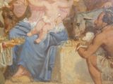 a painting of a woman holding a baby in a manger