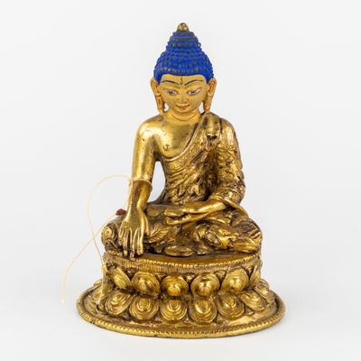 Bouddha Shakyamuni assis, bronze doré et patiné, 20e siècle.