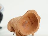 a little boy that is playing with a clay object