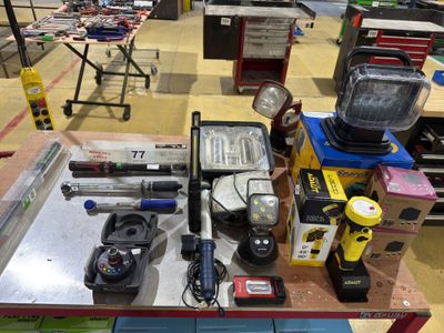 a lot of tools that are sitting on a table