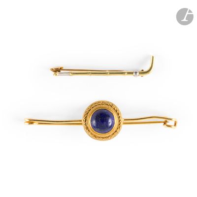 a pair of lapel pins with lapis and diamonds