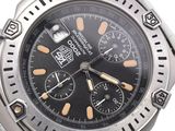 a close up of a watch on a white background