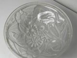 a glass bowl on a white counter top