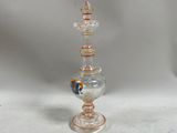 an image of a glass vase sitting on top of a table