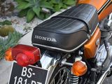 a motorcycle that is parked on the side of the street
