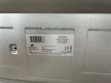 a label on the back of a refrigerator door