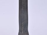an image of a metal object on a white surface