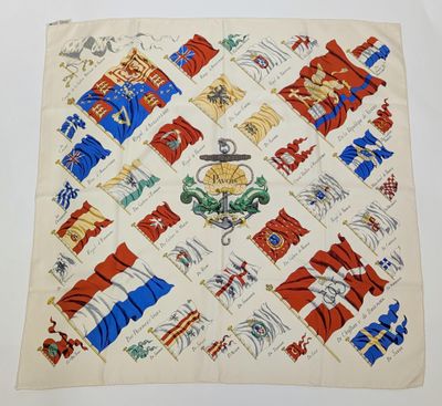 an image of a table cloth with a pattern of flags and symbols