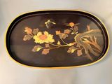 a tray with a painting of birds and flowers on it