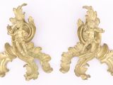 pair of antique gold leaf and acanthus wall sconces on a white background