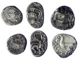 six ancient roman coins with faces and heads on them