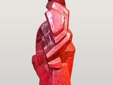 statue of a man with a hat on his head and a bag on his back