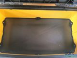 a close up of the trunk of a car with a tray in it