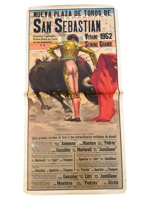 an old newspaper advertises a bullfight in san sebastian, spain