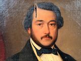 portrait of a man in a tuxedo and bow tie