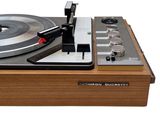 a turntable with a record player on top of it