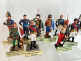 many figurines of men in military uniforms on display