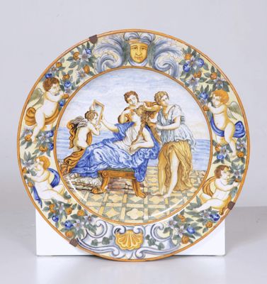 CASTELLI, dans le goût de. Plat circulaire en faïence et éma…