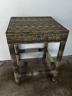 an image of a wicker side table with a wooden top