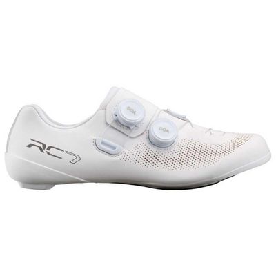 a close up of a pair of white shoes on a white background