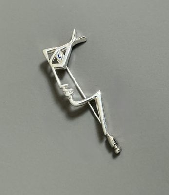 sterling silver arrow broochle with blue topaze stone