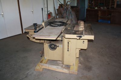 a picture of a workbench in a garage with tools on it