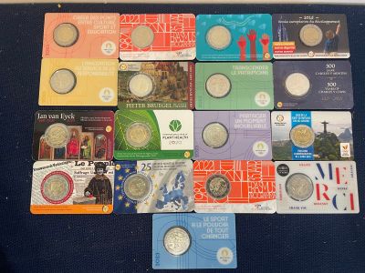 a lot of different types of coins on the table