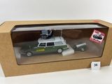 toy car in a box with a man on top of it