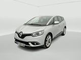 a white car in a white room with a white floor