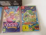 two nintendo wii games on the table